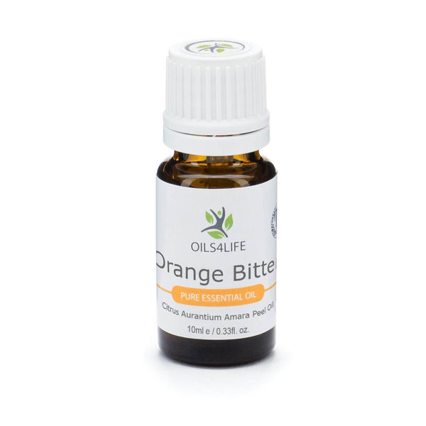 Bitter Orange Essential Oil bottle surrounded by sliced bitter oranges and green citrus leaves on a white background