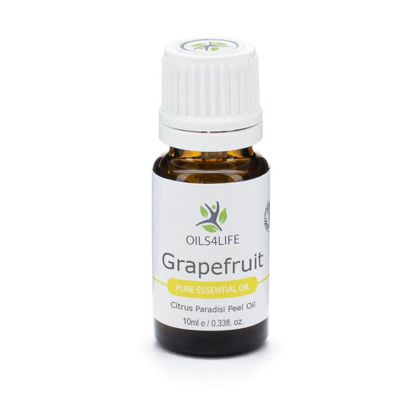 Grapefruit essential oil bottle with pink grapefruit slices – Oils4life pure Citrus paradisi oil.