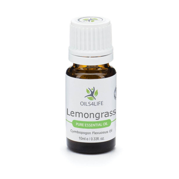 Amber bottle of Lemongrass Essential Oil surrounded by fresh lemongrass stalks on a white background