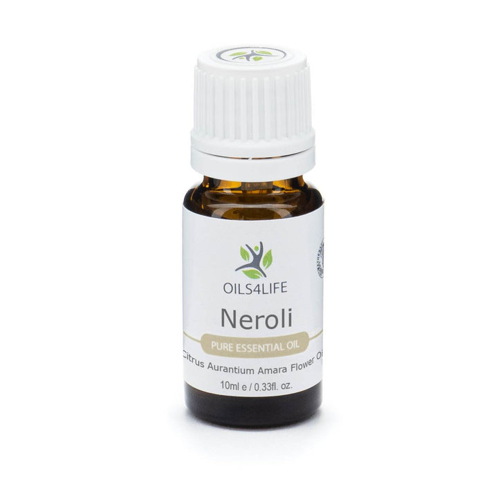 Neroli Essential Oil bottle with fresh orange blossoms and citrus fruits on a neutral background