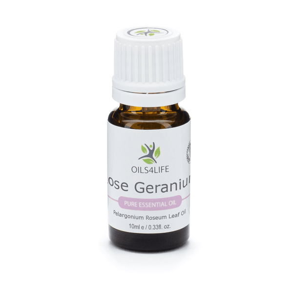 Rose Geranium Essential Oil bottle with pink geranium flowers and green leaves on a white background