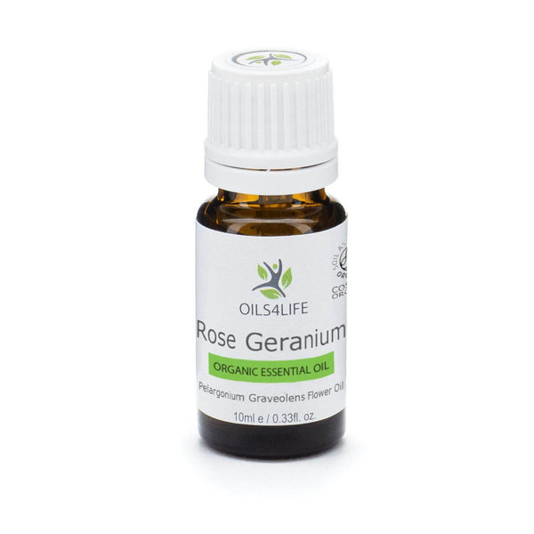 Rose Geranium Essential Oil bottle with pink geranium flowers and green leaves on a white background