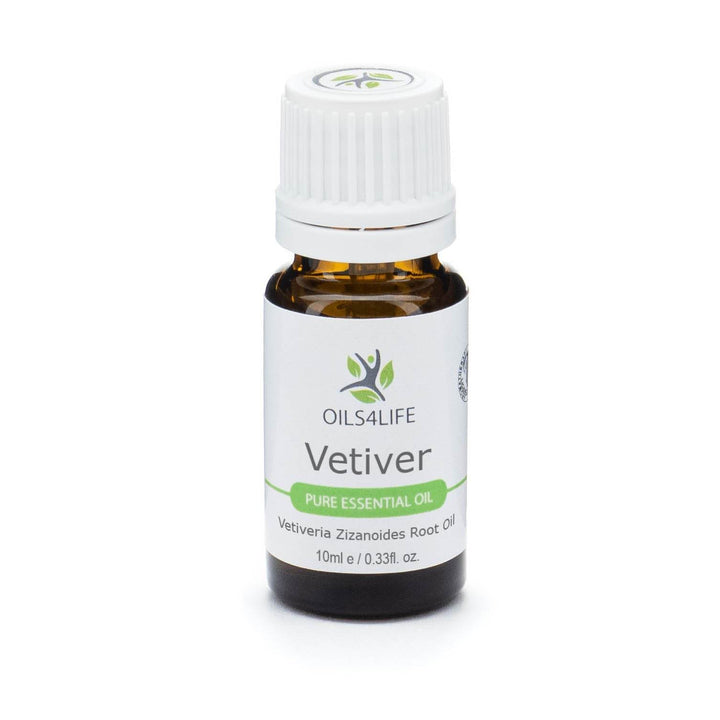 Vetivert Essential Oil bottle with vetiver roots on a clean white background